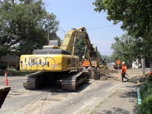 Excavator digging for new sewer on Concord St. (at south end of ''A'' Street)