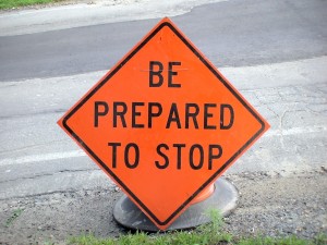 Signs near road construction work advise drivers to Be Prepared To Stop in Framingham, MA.