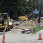 Construction workers install sewer mains near Framingham Centre Common, (August 2011)