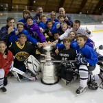 Framingham Youth Hockey Peewee ''A'' Team with coaches Phil Idelson (left), Joe MacIness (center, back), and Charlie Stefanini (right), were lucky enough to be on the ice when the cup arrived at Loring Arena.